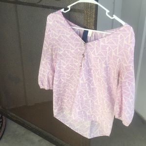 Triangle patterned purple blouse w/ pearl buttons.